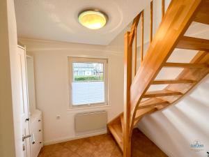 Postel nebo postele na pokoji v ubytování Ferienhaus Seepferdchen Duhnen