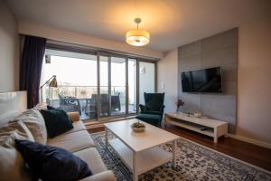 TV a/nebo společenská místnost v ubytování Apartview Bukowa III by Rent like home