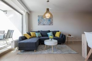 Posezení v ubytování Apartview Bukowa III by Rent like home