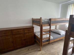Posteľ alebo postele v izbe v ubytovaní Apartmány Crystalindo