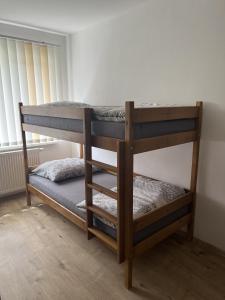 Posteľ alebo postele v izbe v ubytovaní Apartmány Crystalindo