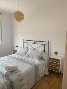 Posteľ alebo postele v izbe v ubytovaní Acogedor apartamento en el paraiso