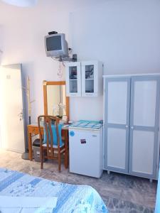 Kuchyň nebo kuchyňský kout v ubytování Massouri Rooms