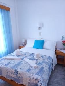 Postel nebo postele na pokoji v ubytování Massouri Rooms