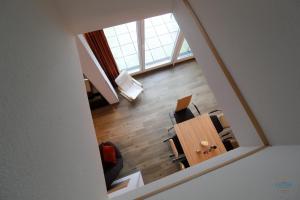 TV a/nebo společenská místnost v ubytování Residenz Hohe Lith Wohnung 28