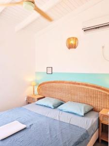 Ένα ή περισσότερα κρεβάτια σε δωμάτιο στο 12 Casa Hermanito