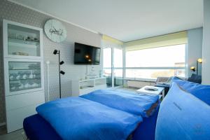 Katil atau katil-katil dalam bilik di Haus Frische Brise Wohnung 7 10 Inselblick +12 gambar