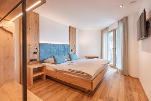 Postel nebo postele na pokoji v ubytování Linhea Apartments