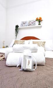 Postel nebo postele na pokoji v ubytování VATICAN ERA Guest House