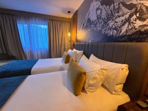 Cama ou camas em um quarto em Alto Andino Hotel