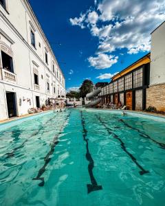 a swimming pool in the middle of a building at Palace Hotel de Caxambu in Caxambu