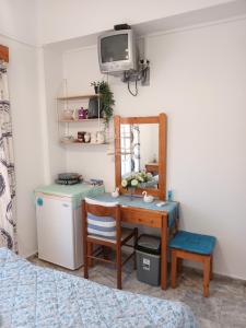 Kuchyň nebo kuchyňský kout v ubytování Massouri Rooms