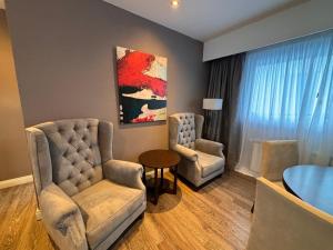 Uma área de estar em Alto Andino Hotel