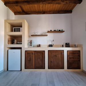 Kuchyň nebo kuchyňský kout v ubytování To Pefko - Mezzanines -