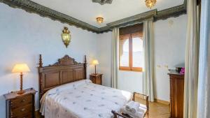 Postel nebo postele na pokoji v ubytování Casa Alcazaba de Beas Velez-Malaga by Ruralidays + 18 fotografií