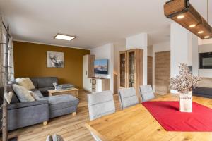 Posezení v ubytování Ferienhäuser Kaiserluft Chalet