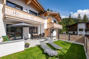 Aed väljaspool majutusasutust Ferienhäuser Kaiserluft Chalet