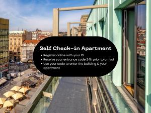 a sign that reads self check in apartment on a building at VN3 Terraces Suites by Adrez in Prague