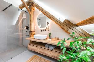 Koupelna v ubytování Apartmány Marienhof + 37 fotografií