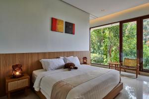 Postel nebo postele na pokoji v ubytování Jasmine cozy villa 3 bedrooms with a private heated swimming pool and a billiard table + 25 fotografií