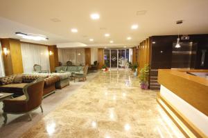 a lobby with couches and a living room at Giresun Sedef Hotel in Giresun