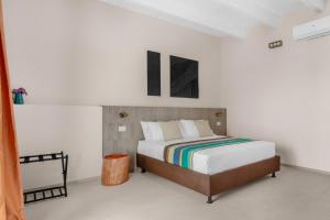 a bedroom with a bed in a white room at Sabhé Gallipoli in Gallipoli +128 photos