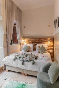 Postel nebo postele na pokoji v ubytování Riad N'S & Spa