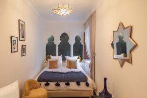 Postel nebo postele na pokoji v ubytování Riad N'S & Spa