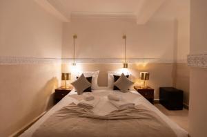 Postel nebo postele na pokoji v ubytování Riad N'S & Spa