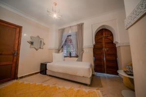Postel nebo postele na pokoji v ubytování Riad N'S & Spa