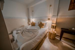 Postel nebo postele na pokoji v ubytování Riad N'S & Spa