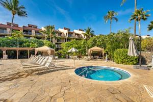 a resort with a swimming pool and a hotel at Kamaole Sands 8-402 - 2 Bedrooms, Pool Access, Spa, Sleeps 6 in Wailea