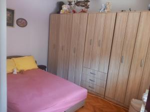 Postel nebo postele na pokoji v ubytování Apartman Andrija
