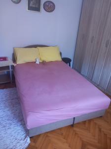 Postel nebo postele na pokoji v ubytování Apartman Andrija