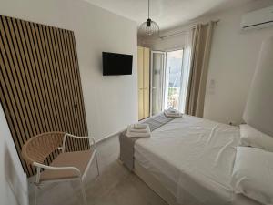 Postel nebo postele na pokoji v ubytování Panima Rooms