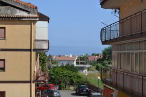 a view of a street between two buildings at Naxos Sweet Dreams Apartment in Giardini Naxos