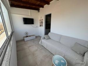 TV a/nebo společenská místnost v ubytování Panima Rooms