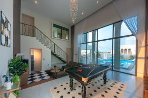 Afbeelding uit fotogalerij van Baan Charoenjai Poolvilla Cha-am in Cha Am