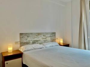 Postel nebo postele na pokoji v ubytování Apartamentos Port Marina