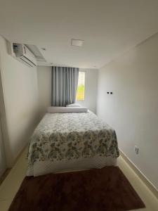 Ένα ή περισσότερα κρεβάτια σε δωμάτιο στο Apartamento SAJ