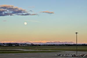 an airport with the moon in the sky at Moxy Lyon Airport in Saint-Exupéry