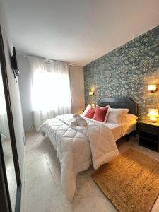 Postel nebo postele na pokoji v ubytování Casa Sant Antoni