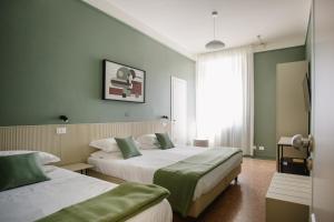 Katil atau katil-katil dalam bilik di Hotel San Marco Sestola