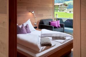Una cama o camas en una habitación de Smaragdresort