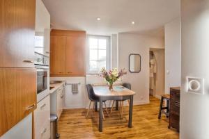 Η κουζίνα ή μικρή κουζίνα στο Appartement moderne, vue mer