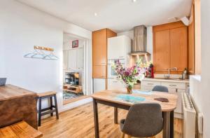 Kuchyň nebo kuchyňský kout v ubytování Appartement moderne, vue mer