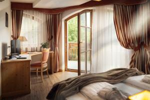 Postel nebo postele na pokoji v ubytování Hotel Alte Mühle 4 Stelle