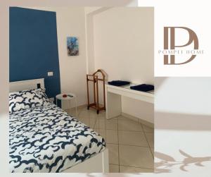Letto o letti in una camera di DP Pompei Home