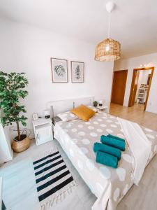 Postel nebo postele na pokoji v ubytování Summer Breeze Apartment