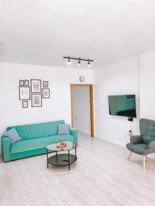 Posezení v ubytování Summer Breeze Apartment